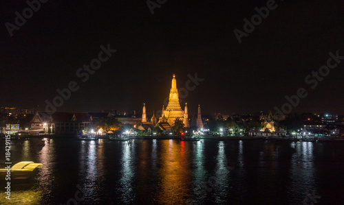 Night View of WAT ARUN (TEMPLE OF DAWN) and Chao Phraya River, Bangkok, Thailand. © black_J