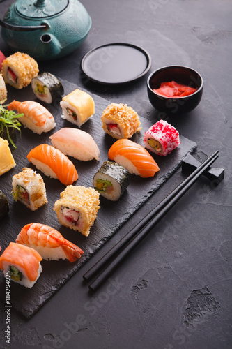 Sushi and rolls background, japanese cuisine