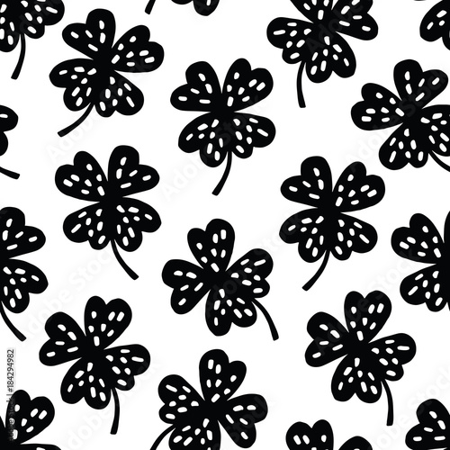 Cute seamless black and white shamrock clover pattern. Good luck concept. Vector illustration background.