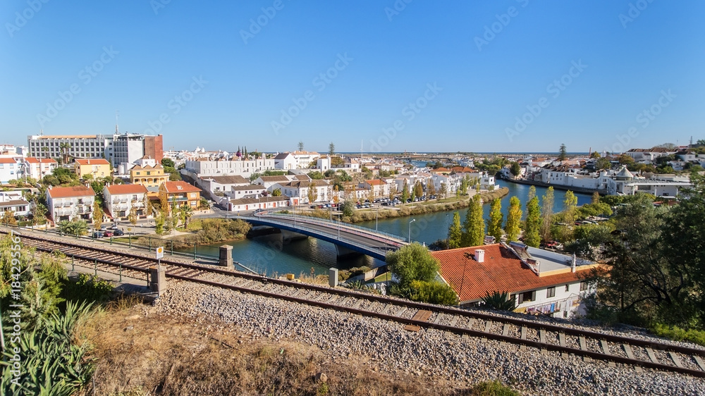 Obraz premium Aerial. The town of Tavira on the River Arade and railroad.