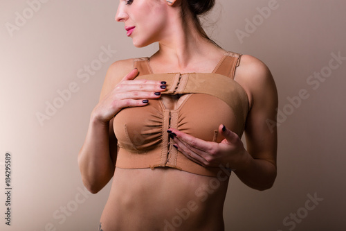 Obraz na płótnie Woman wearing a compressing bra