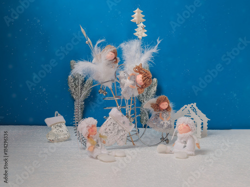christmas card with angels on a blue background photo