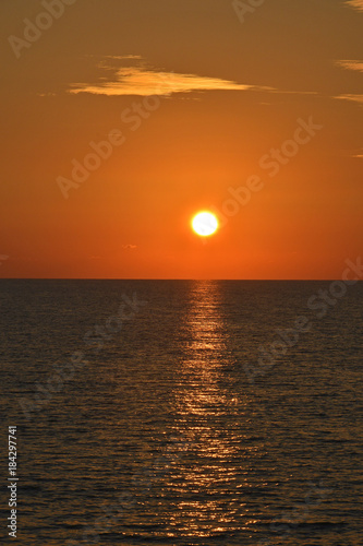 Colourful sunset over the sea at Paphos Cyprus