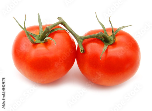 Two ripe tomatoes isolated on white background