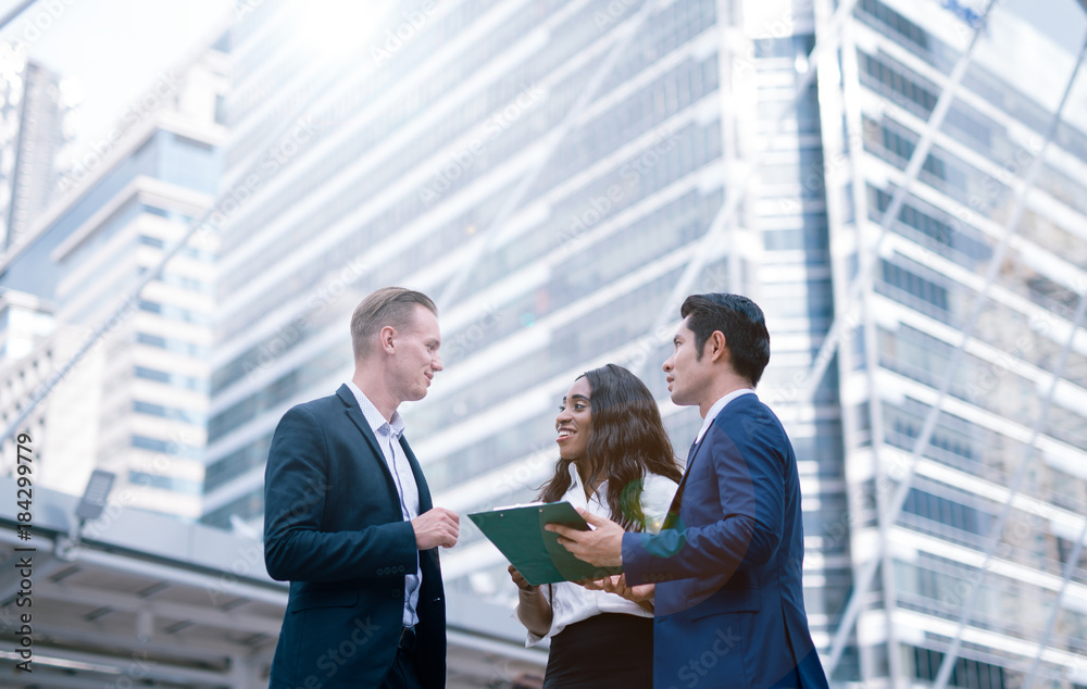 Group of business people.Business people meeting talking and sharing their ideas in city. Group of business people.Business people meeting talking and sharing their ideas in city.