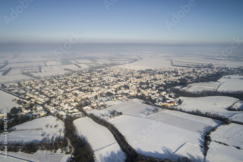 Aerial winterwonderland view with drone of snowy forest in Lower Austria
