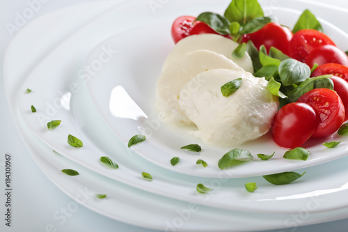 Mozzarella with tomato.