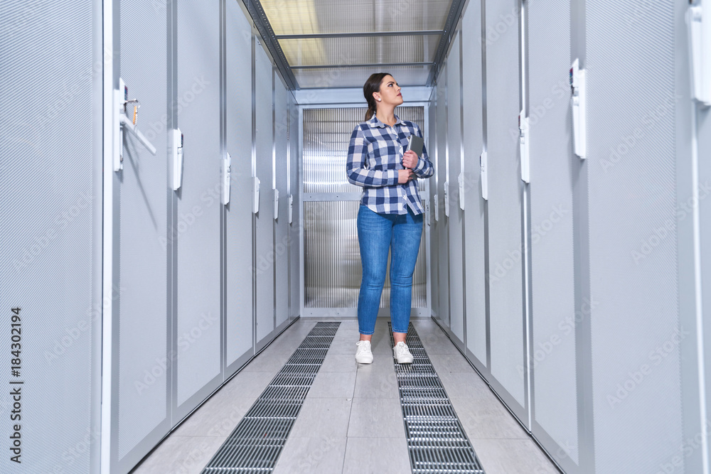 female technician working on server maintenance