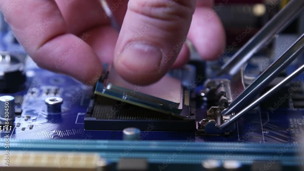 Extraction of the central processor from a motherboard socket. Extraction of the central processor from a motherboard socket.