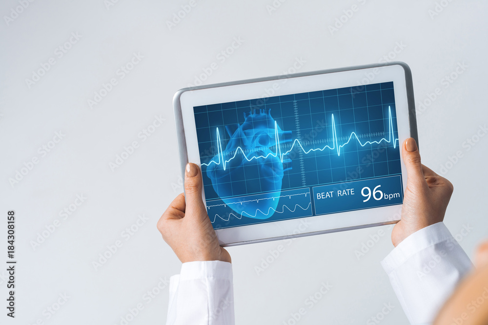 Close of female doctor hands working with tablet pc computer Close of female doctor hands working with tablet pc computer