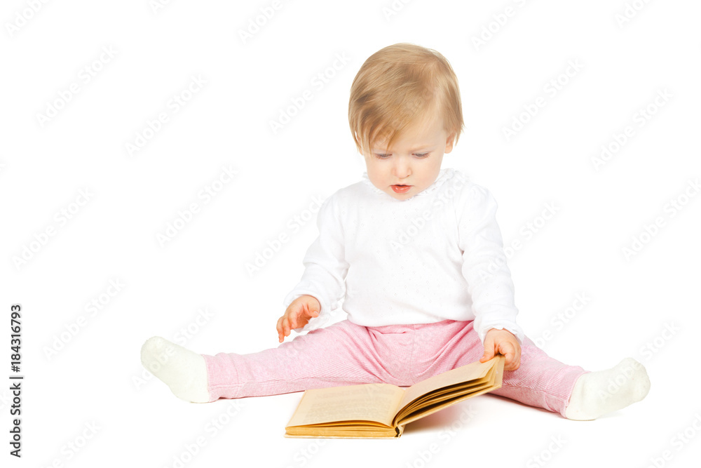 Caucasian baby girl holding a book isolated on white background Caucasian baby girl holding a book isolated on white background