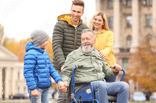 Elderly man in wheelchair w...