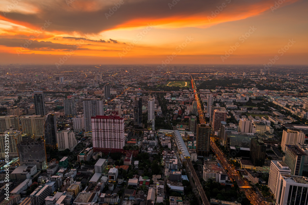 bright orange sunset over the city of Bangkok, Thailand