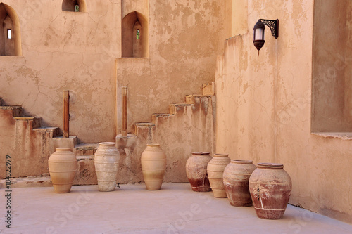 Inner court of Jabrin Castle with typical painted pottery, Fort of Jabrin, Sultanate of Oman photo