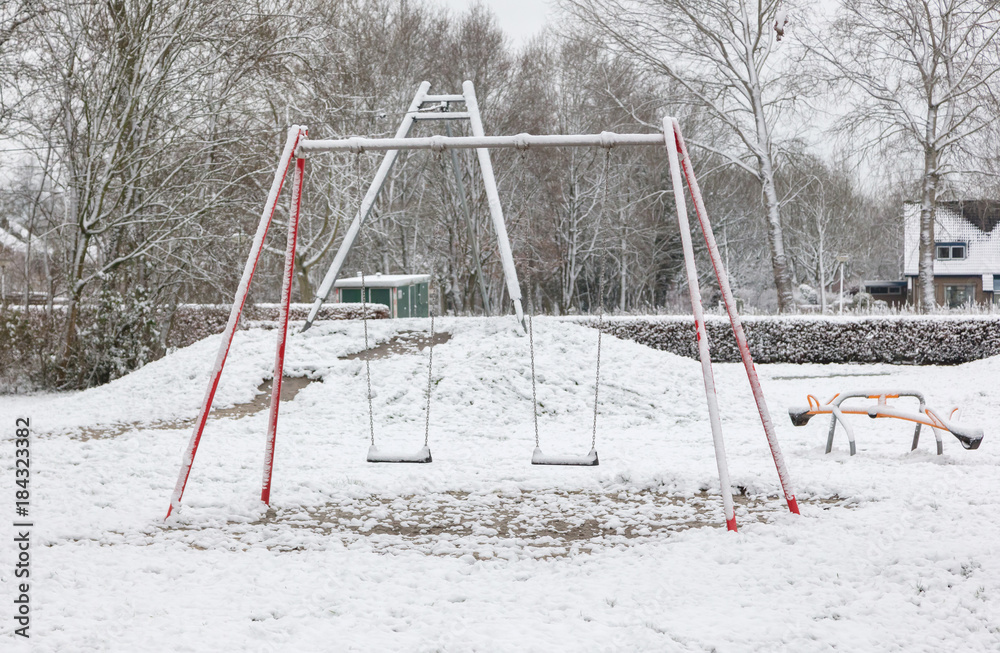 Empty swing in playground Empty swing in playground