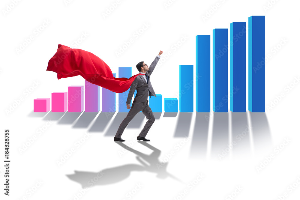 Young businessman in business concept with bar charts Young businessman in business concept with bar charts