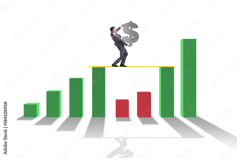 Fototapeta premium Young businessman in business concept with bar charts