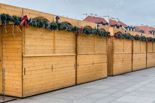 Christmas wooden market stalls closed during early morning