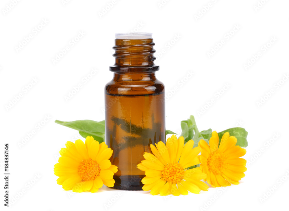 aromatherapy essential oil with marigold flowers isolated on white background
