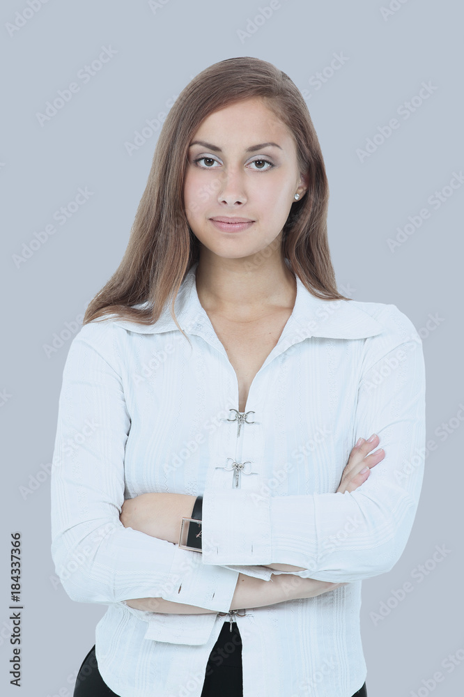 Portrait of an employee in a bright jacket on a gray background Portrait of an employee in a bright jacket on a gray background