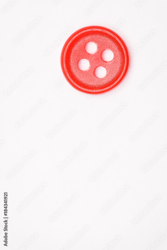 Sewing buttons on white background close up Sewing buttons on white background close up