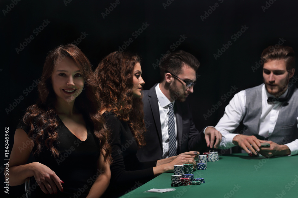 modern business woman sitting at craps table in a casino. modern business woman sitting at craps table in a casino.