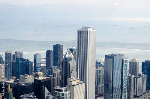 aerial view of Chicago cityscape with frozen Lake Michigan background