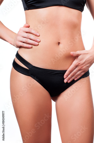 Woman waist. Girl with perfect body shape, flat belly in underwear. © Dmytro Flisak