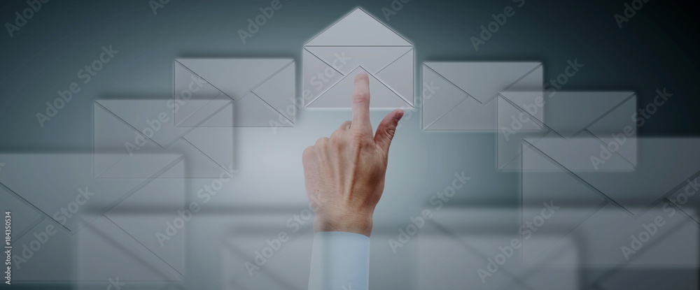 Businessman choosing e-mail icons Businessman choosing e-mail icons
