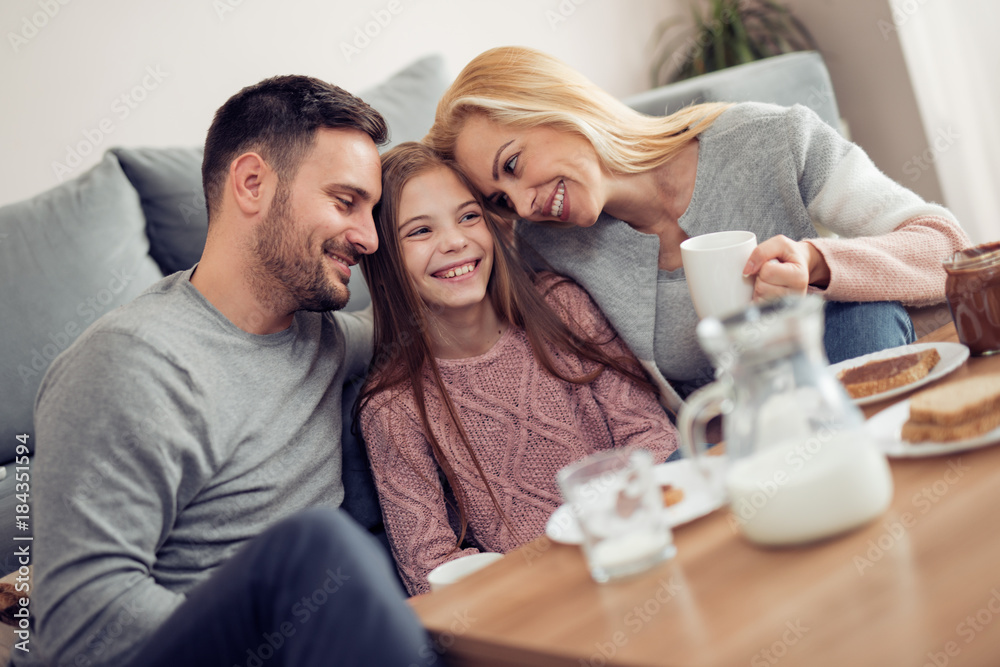 Happy family having breakfast at home Happy family having breakfast at home