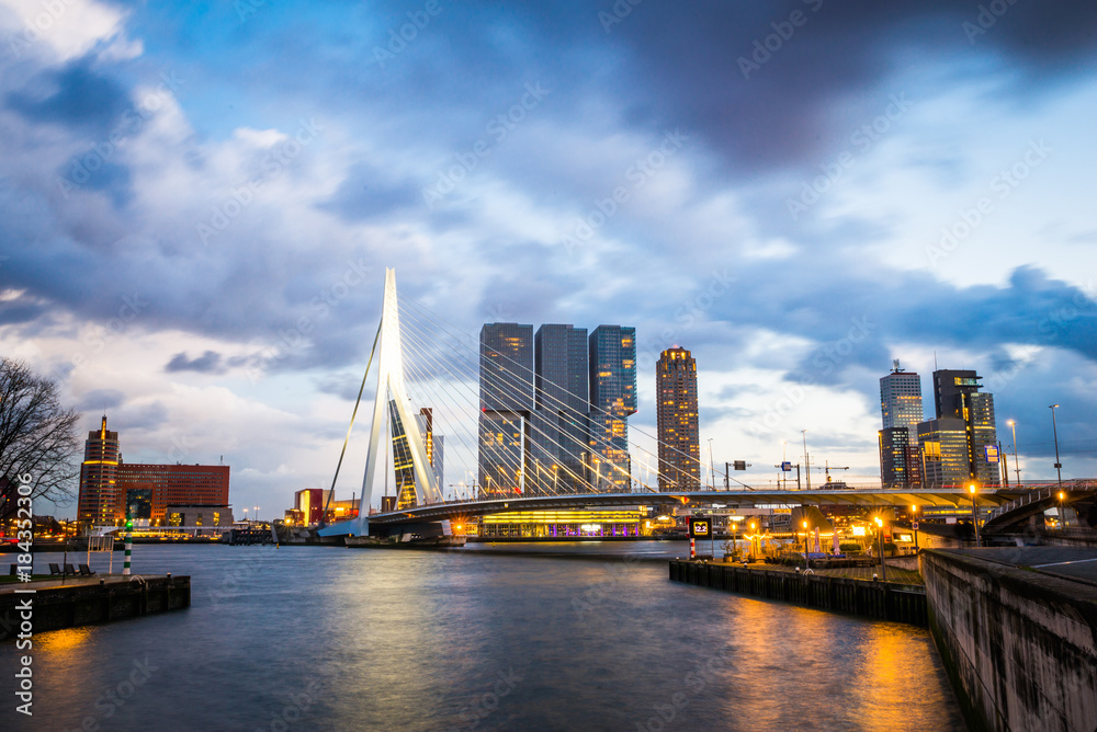 Rotterdam city after sunset, dramatic sky. Holland, Western Europe