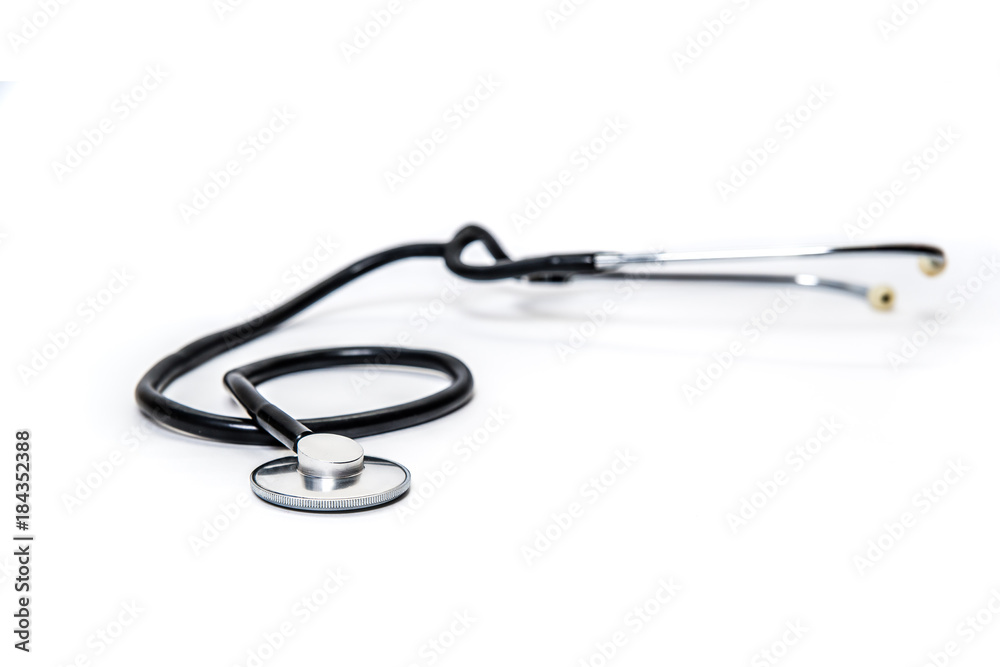 Stethoscope. Black stethoscope isolated white background. Cardiac examination, heart murmurs test, lung diseases, breathing problems. Doctor, medicine, cardiologist, concept of treatment. Stethoscope. Black stethoscope isolated white background. Cardiac examination, heart murmurs test, lung diseases, breathing problems. Doctor, medicine, cardiologist, concept of treatment.