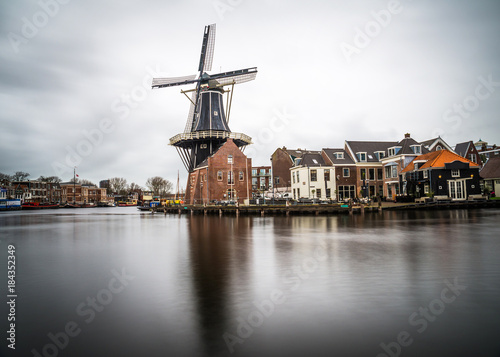 Beautiful windmill view from Haarlem city center on a cloudy day, Holland.