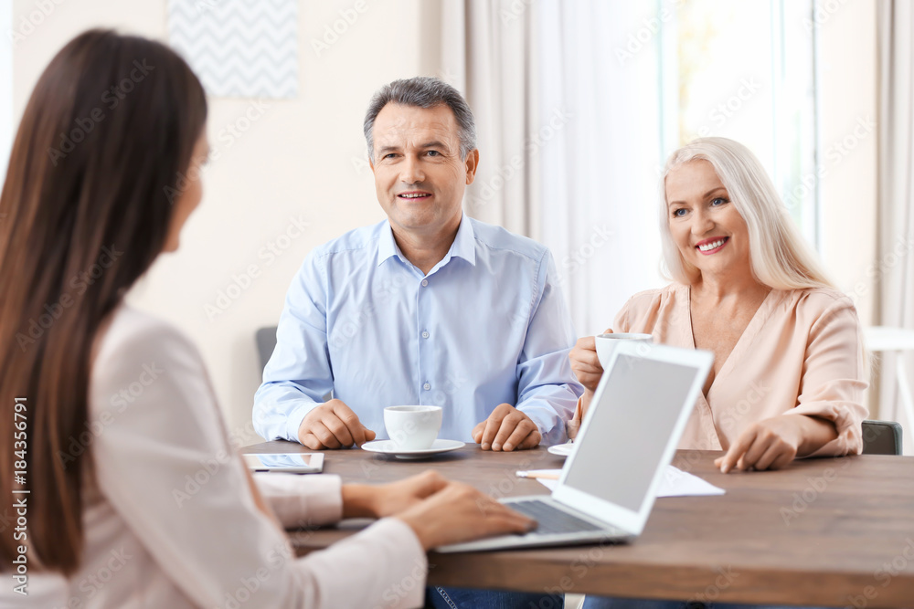Senior couple at insurance agency Senior couple at insurance agency