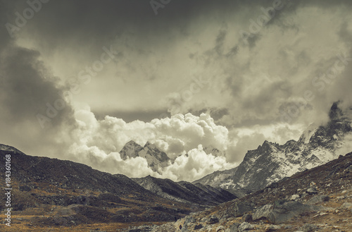 Mountain landscape with dramatic sky photo