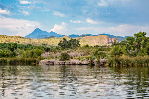 Patagonia Lake State Park with the Santa Rita Mountains in the shadow of a looming monsoon storm. Southern Arizona,