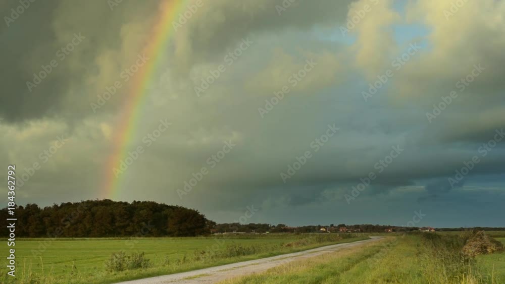 rainbow over rural Dutch landscape rainbow over rural Dutch landscape