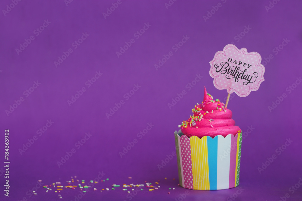 Tasty strawberry cupcake with sprinkles and Happy Birthday banner on violet  background. Party background Stock Photo | Adobe Stock