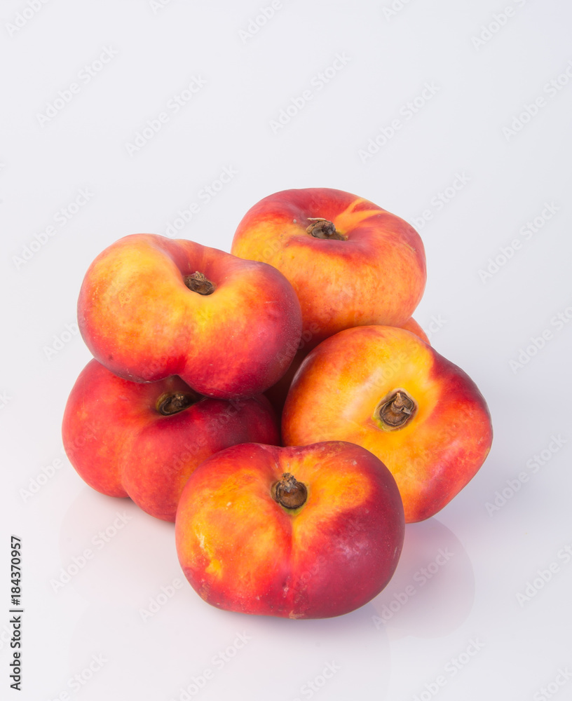 flat peaches (donut peaches) on a background flat peaches (donut peaches) on a background