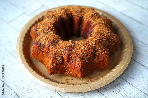 Obraz na płótnie An apple cider ring cake with cinnamon sugar baked in a Bundt pan