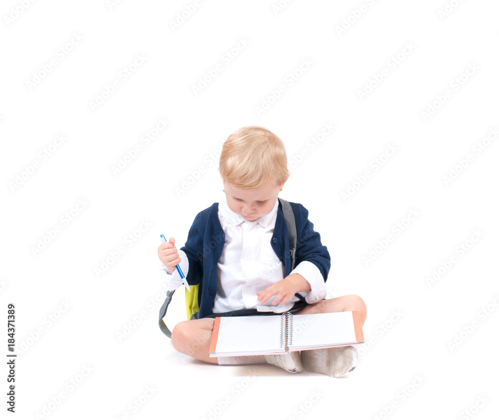 Happy little schoolgirl. Child with backpack and books. Happy little schoolgirl. Child with backpack and books.