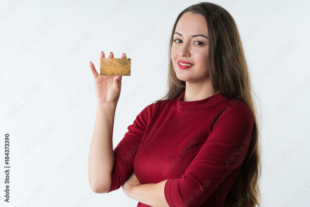 Happy woman hold gold credit card and smiling, isolated. on White background Happy woman hold gold credit card and smiling, isolated. on White background