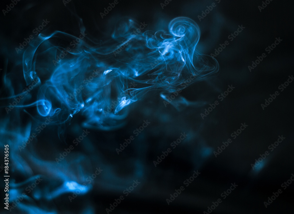blue Smoke on black background , beautiful smoke,Fluffy Puffs of Smoke blue Smoke on black background , beautiful smoke,Fluffy Puffs of Smoke
