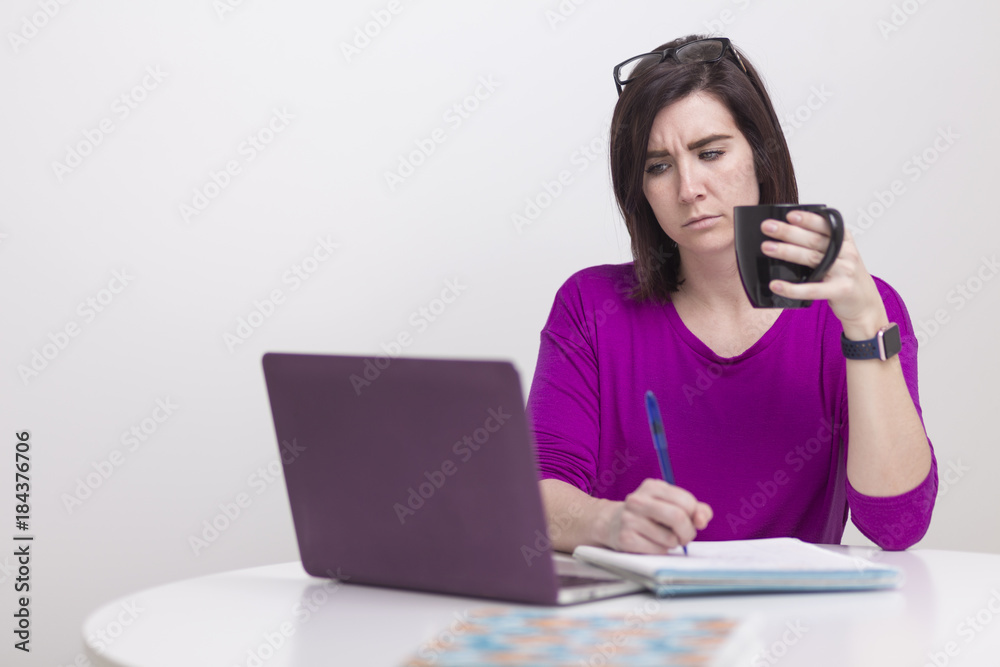 woman in Zoom meeting on laptop working from home woman in Zoom meeting on laptop working from home
