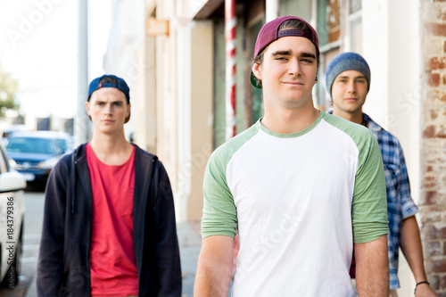 Teenage friends walking at the street