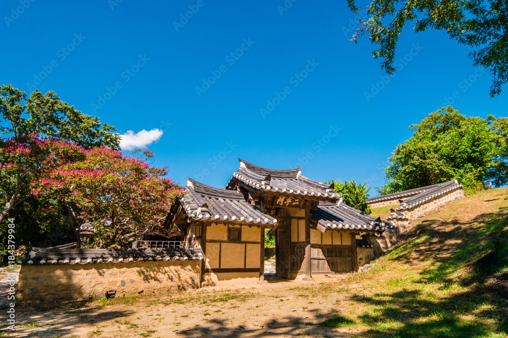 Gyeongju, South Korea - Ihomun Gate of Yangdong Folk Village. (sign board text is 