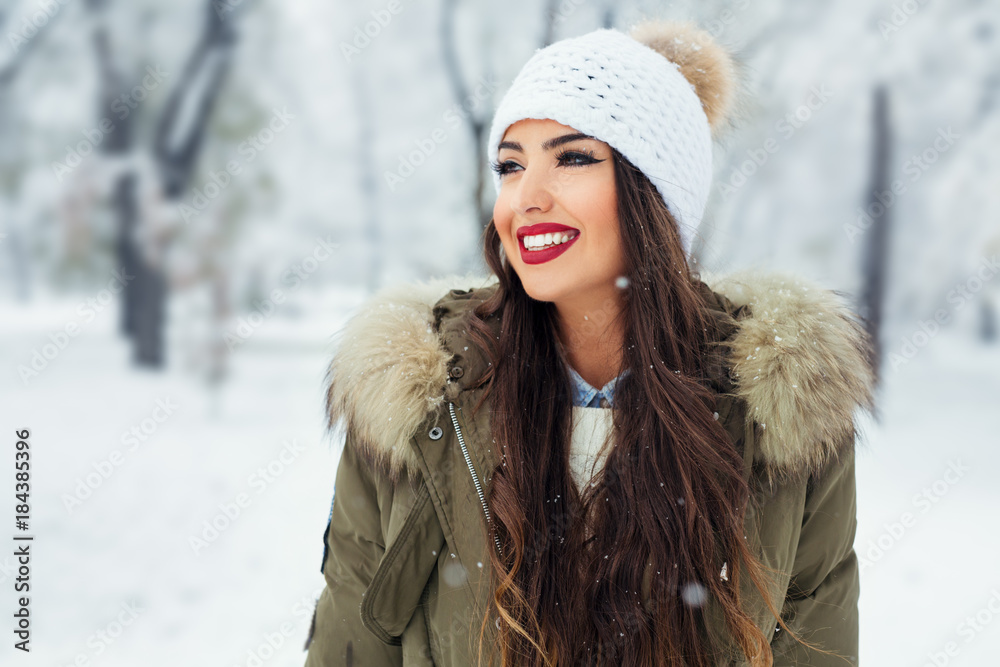 Attractive young woman in wintertime outdoor Attractive young woman in wintertime outdoor