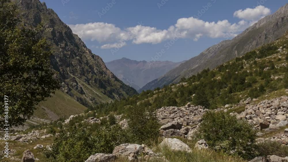 Russia, Republic of Kabardino-Balkaria, time lapse. Summer in the mountains of the Caucasus. Formation and movement of clouds over mountains peaks. Russia, Republic of Kabardino-Balkaria, time lapse. Summer in the mountains of the Caucasus. Formation and movement of clouds over mountains peaks.