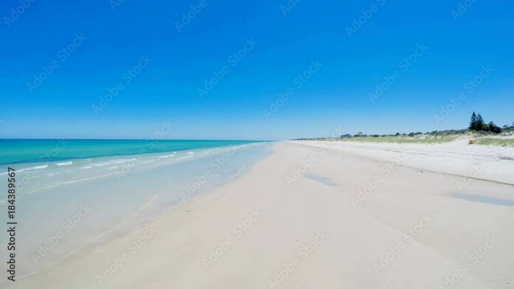 Drone aerial view of wide open white sandy beach, taken at Tennyson Beach, South Australia. Drone aerial view of wide open white sandy beach, taken at Tennyson Beach, South Australia.