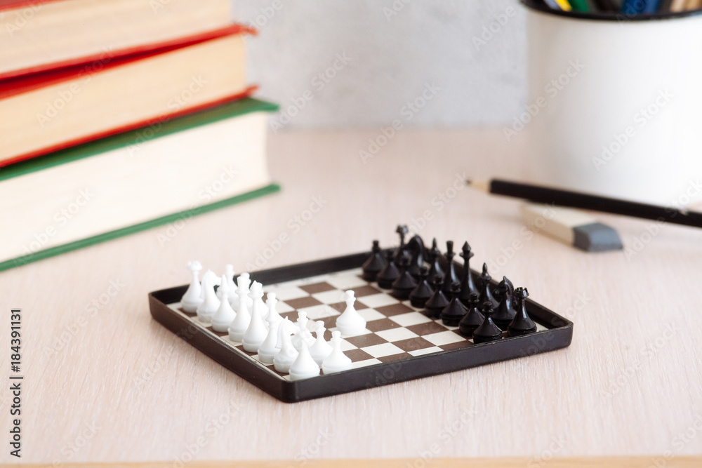The student's desk, with chess books and pencils. The student's desk, with chess books and pencils.